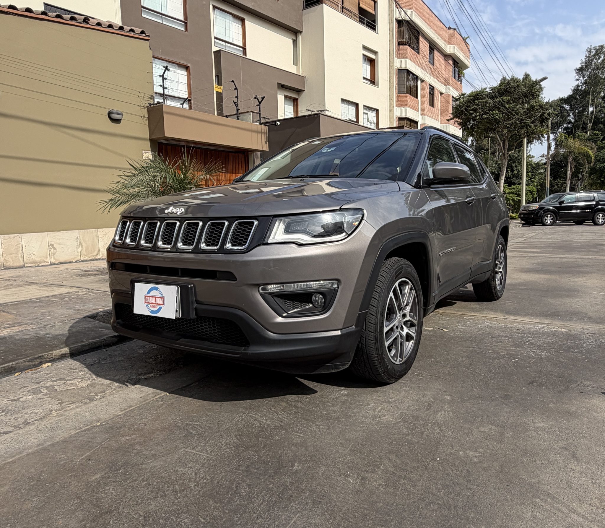 20260609_192057881_iOS Jeep Compass Sport 2022